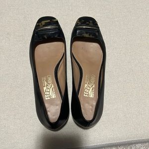 Ferragamo flats with tortoise shell detail. Black leather worn a few times.